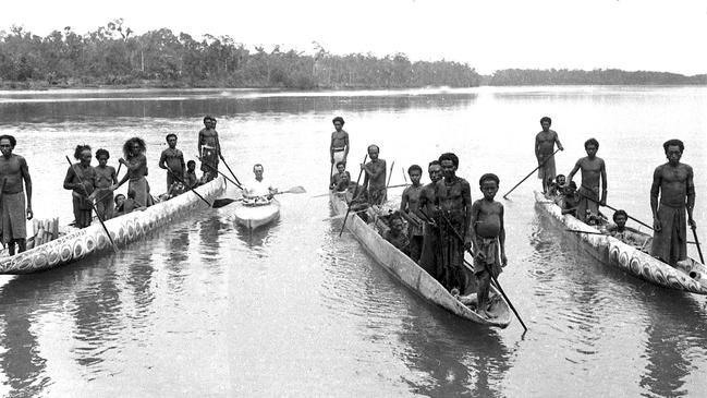 Speck and unidentified villagers in New Guinea in 1939. Picture: Australian National Museum