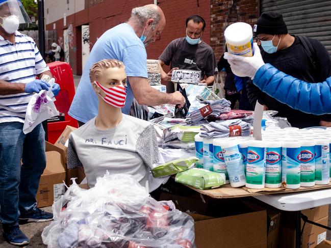 A man sells face masks and disinfection wipes in New York. Picture: AFP