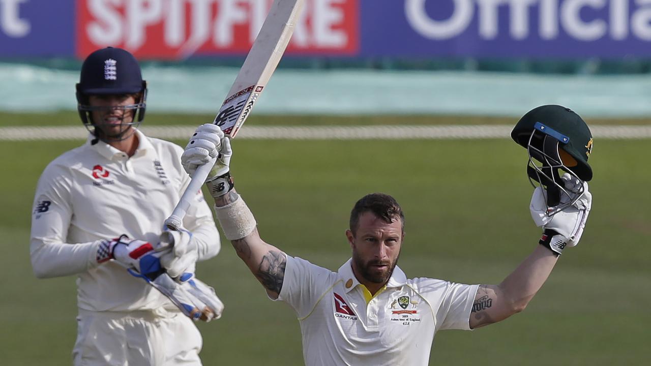 Matthew Wade raises his bat for a superb century. (Photo by Henry Browne/Getty Images)