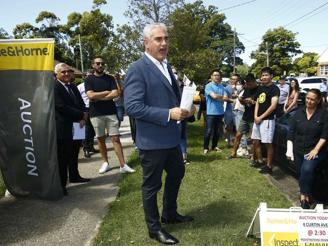 Tom Panos in his role as auctioneer. Picture: John Appleyard