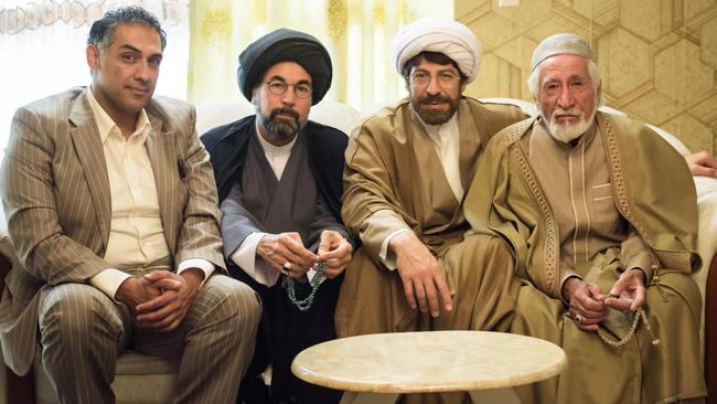 Hilarity ... Don Hany (third from left) as a Muslim cleric in the “truly original” romantic comedy Ali’s Wedding. (Matchbox Pictures)