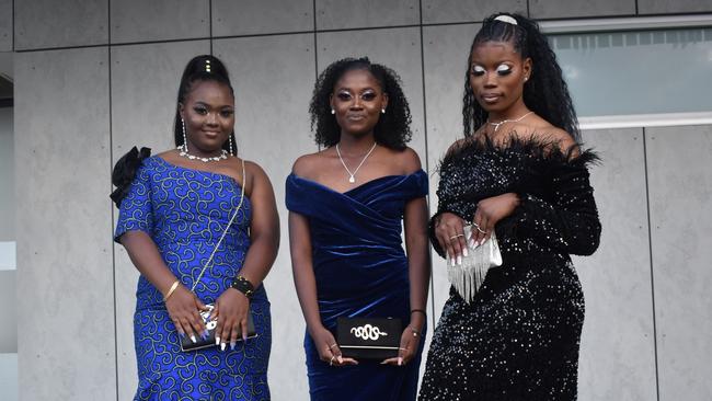 Caline Kanyamuneza, Riziki Nundu, and Kashindi Ivunda at the 2021 Bundamba State Secondary College year 12 formal, Ipswich Turf Club 17th of November 2021. Picture: Jessica Baker
