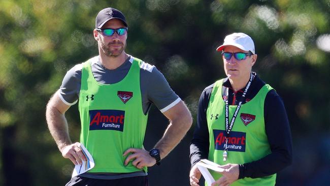 Ben Rutten and John Worsfold watch training on the Gold Coast during the week. Picture: Michael Klein