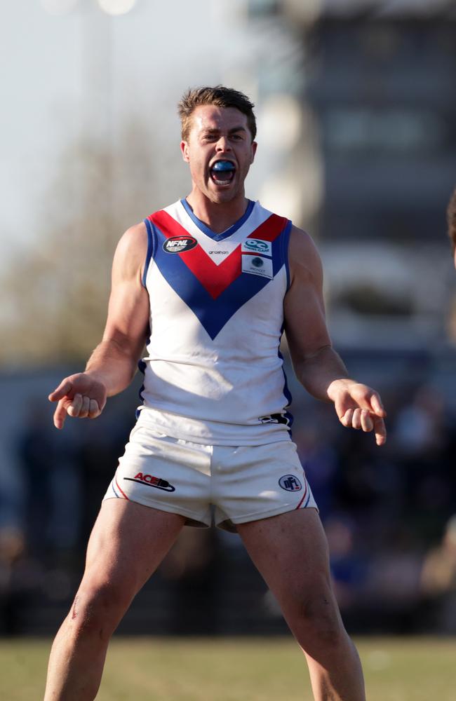 Liam McVeigh celebrates as the final siren sounds.