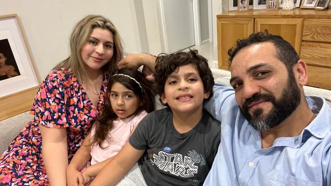 Hero dad Khaled Annewetey with his young family.