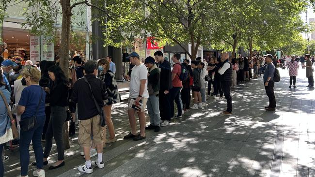 Lines to get into the just-opened Uniqlo have stretched halfway down Rundle Mall.