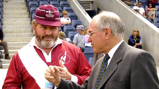 John Howard (right) speaks with ATSIC chairman Geoff Clark in 2004. Picture: AAP/File