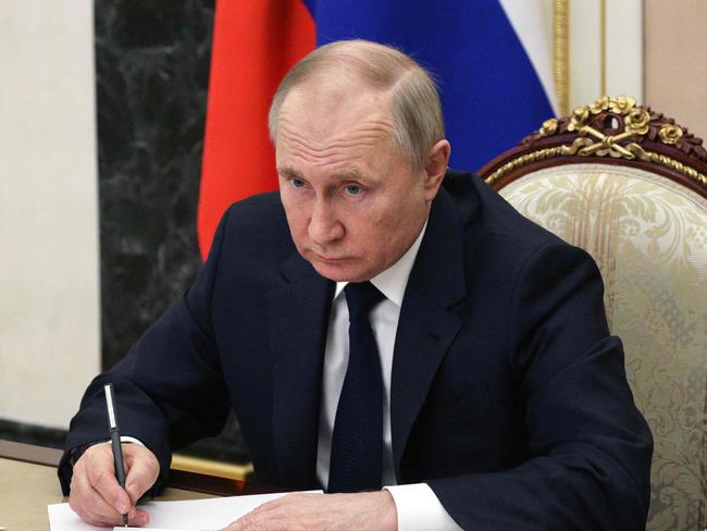 Mr Joyce said the Russian leader was basically murdering people in Ukraine. Picture: Mikhail Klimentyev / SPUTNIK / AFP