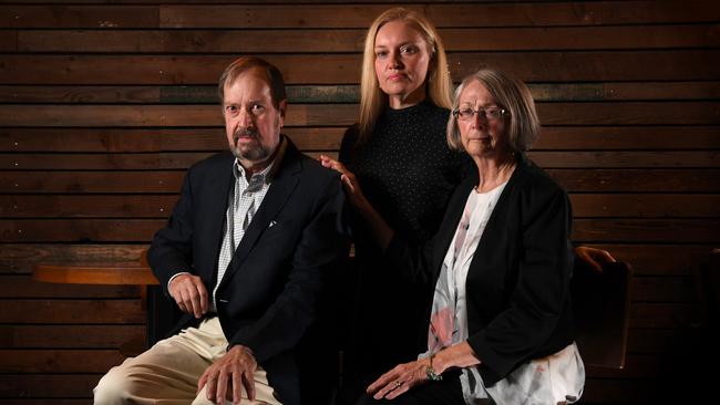 Rebecca Emery, centre, the daughter of Chris McRae. She recalls a lack of apology for the breach. Picture: Tricia Watkinson