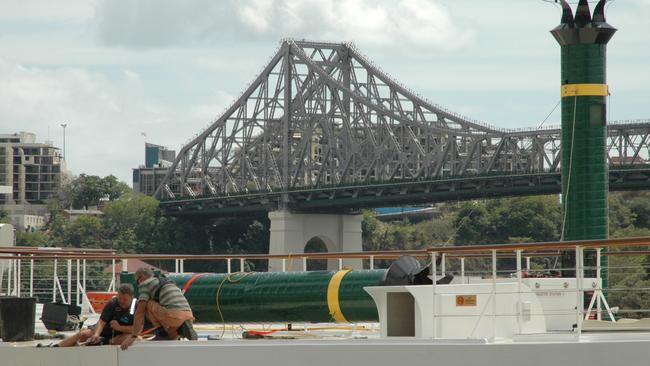 October 2009: The Kookaburra Queen undergoes repairs at Eagle Street Pier. Picture: AAP Image/David Barbeler