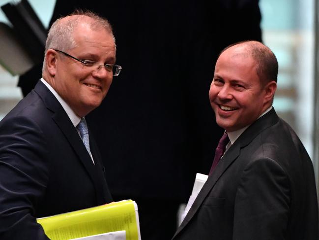 Prime Minister Scott Morrison and Treasurer Josh Frydenberg leave after Question Time in the House of Representatives at Parliament House in Canberra, Tuesday, June 16, 2020. (AAP Image/Mick Tsikas) NO ARCHIVING