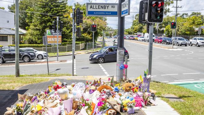 Flowers for Kate Leadbetter and Matty Field at the intersection of Vienna and Finucane Roads at Alexandra Hills. Picture: Richard Walker