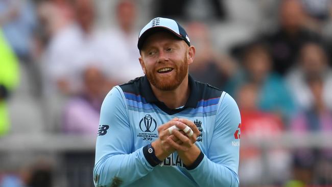 England's Jonny Bairstow takes the catch to dismiss Afghanistan's Rashid Khan during the 2019 Cricket World Cup group stage match between England and Afghanistan at Old Trafford in Manchester, northwest England, on June 18, 2019. (Photo by Dibyangshu SARKAR / AFP) / RESTRICTED TO EDITORIAL USE