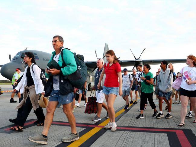 Aussies touched down at Brisbane International Airport on Thursday. Picture: NewsWire/ David Clark