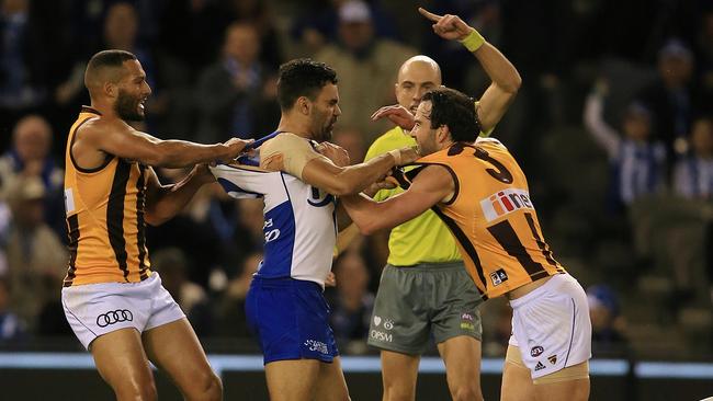 Lindsay Thomas and Jordan Lewis in a scrap. Picture: Wayne Ludbey