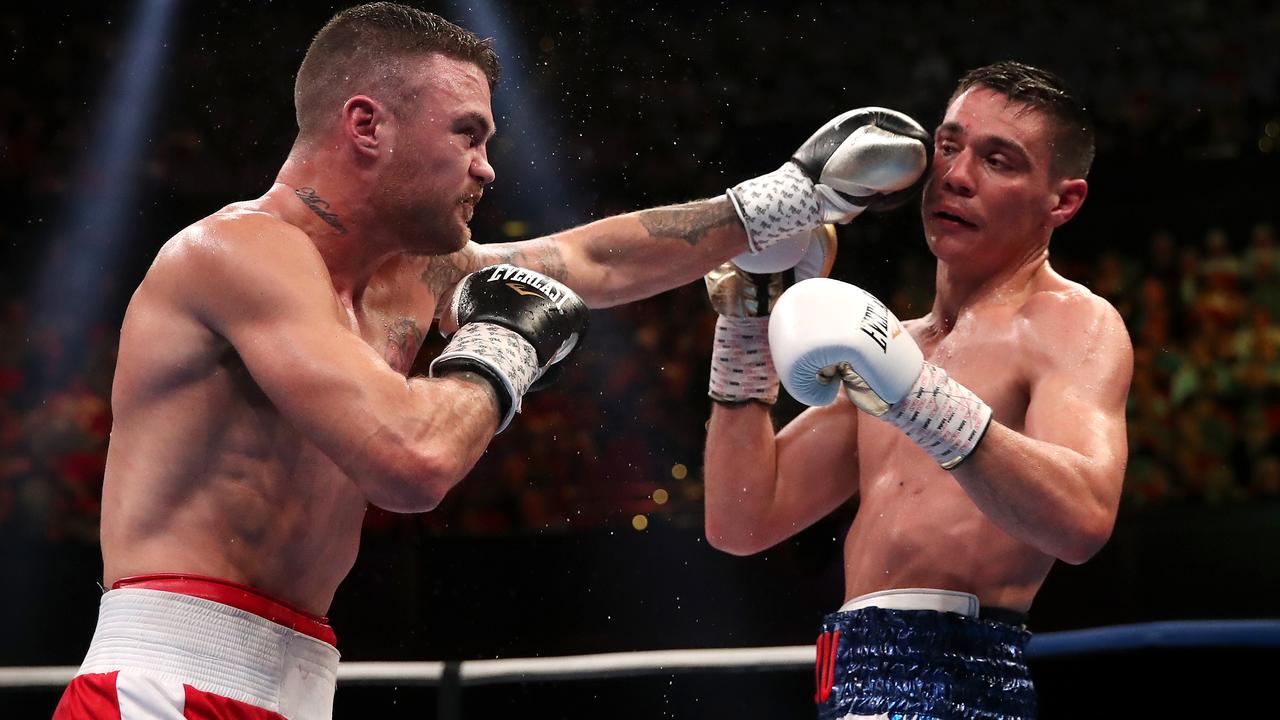 Dwight Ritchie throws a jab at Tim Tszyu during their WBO Global and IBF Australasian super welterweight title fight.