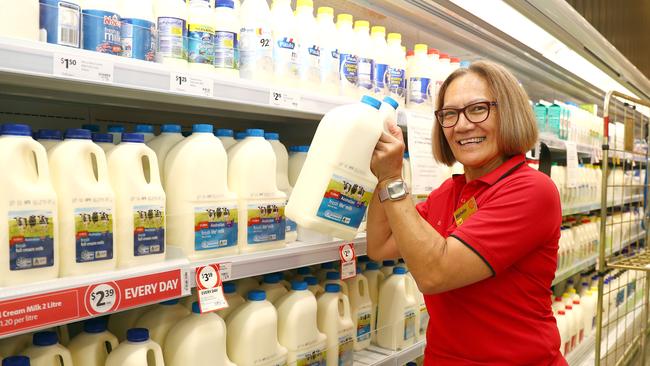 Michelle Lonergan stacking shelves at Coles. Picture: Tertius Pickard