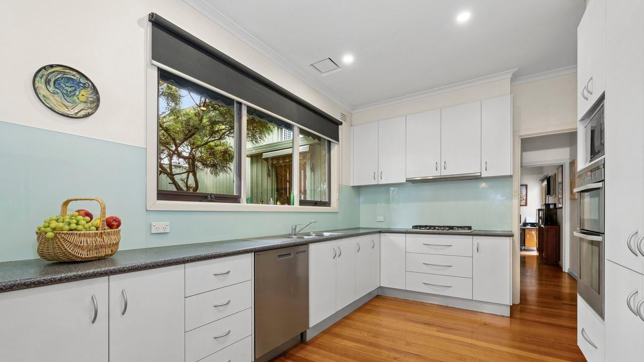 This four-bedroom Mount Waverley home attracted six fierce bidders.