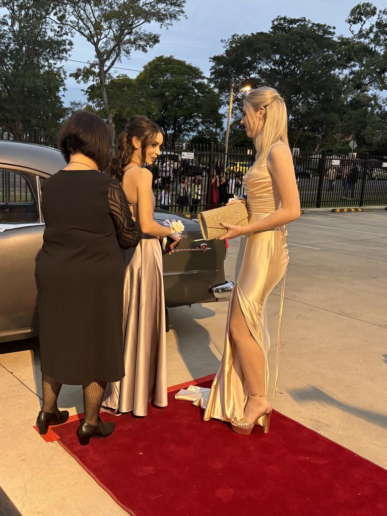 Maryborough State High School students arriving at their formal.