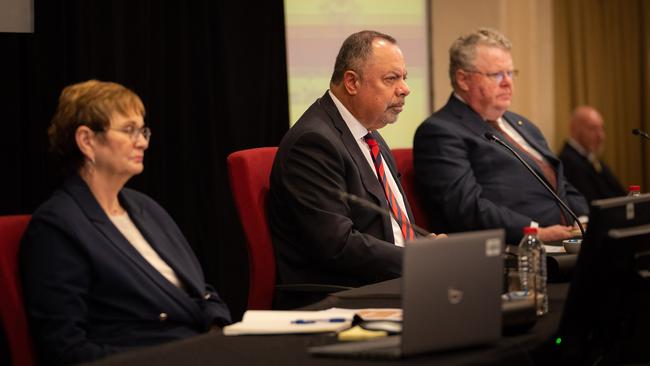Commissioner Nick Kaldas flanked by Peggy Brown and James Douglas as the Royal Commission into Defence and Veteran Suicide hearing opened in Hobart.