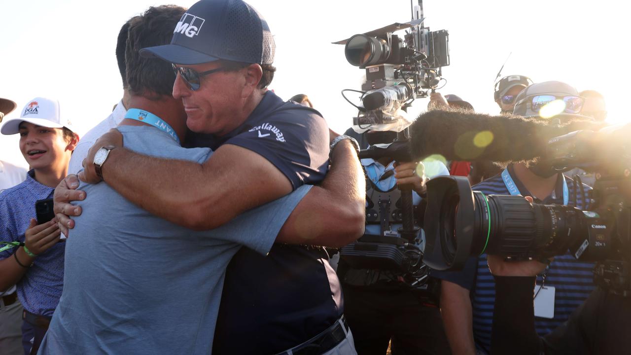 Phil Mickelson revelled in making history.