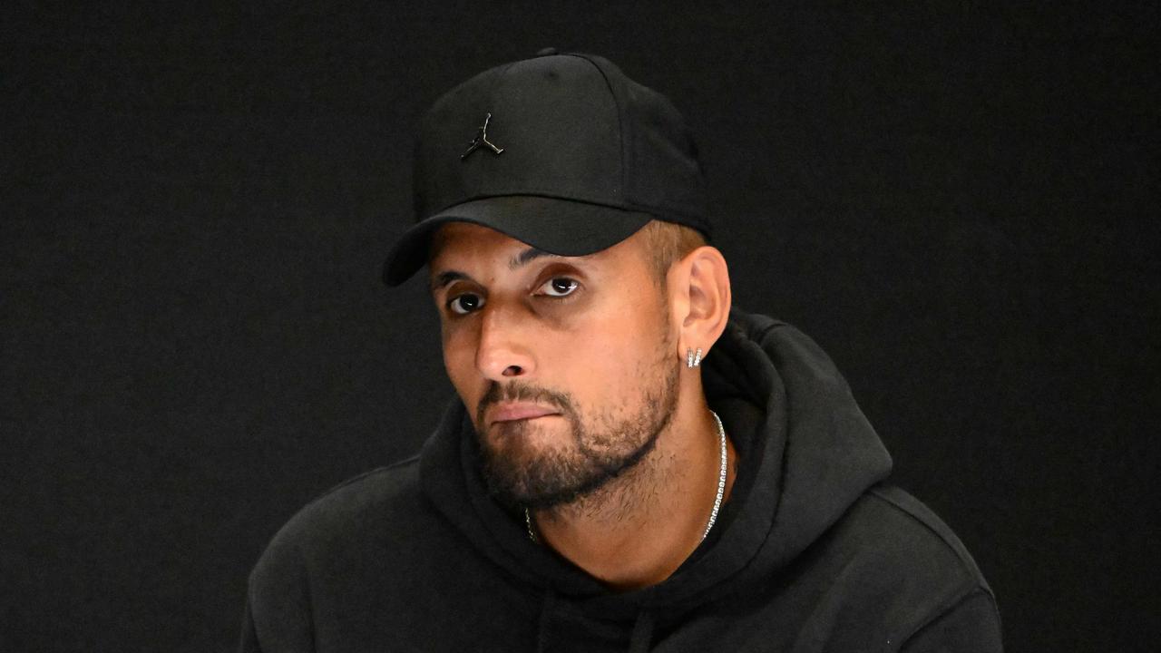 Nick Kyrgios speaks to the media after pulling out of the Australian Open. Picture: Saeed KHAN / AFP