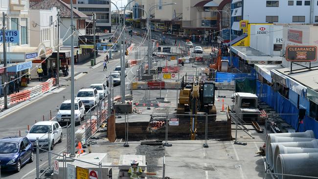 An imagine showing work being carried out on Queensland's first ever light rain system in Southport on the Gold Coast, Tuesday, June 11, 2013. (AAP Image/Dave Hunt)