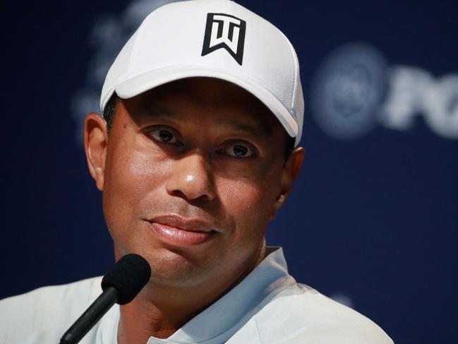 (FILES) In this file photo Tiger Woods of the United States speaks to the media during a press conference prior to the 2018 PGA Championship at Bellerive Country Club on August 7, 2018 in St. Louis, Missouri. - Tiger Woods is not facing charges of reckless driving following the car crash in which he suffered serious leg injuries, authorities said on February 24, 2021. "A reckless driving charge has a lot of elements into it, this is purely an accident," Los Angeles County Sheriff Alex Villanueva told reporters. (Photo by ANDY LYONS / GETTY IMAGES NORTH AMERICA / AFP)