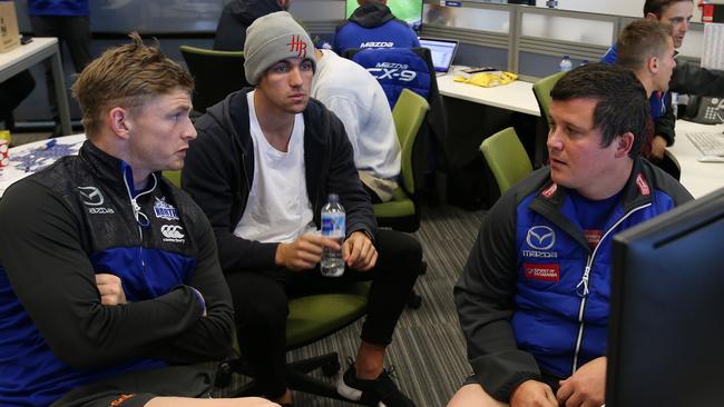 Jack Ziebell does his individual player review with assistant coach Jarred Moore as Ryan Clarke looks on Pic: Michael Klein