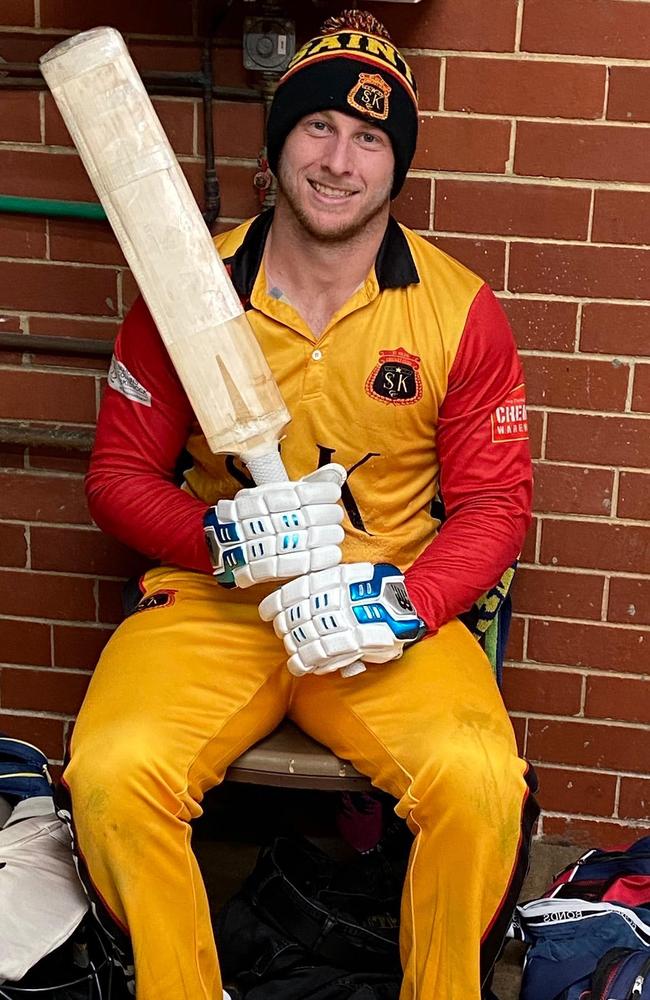 Michael De Iacovo relaxes in the rooms after his ton.