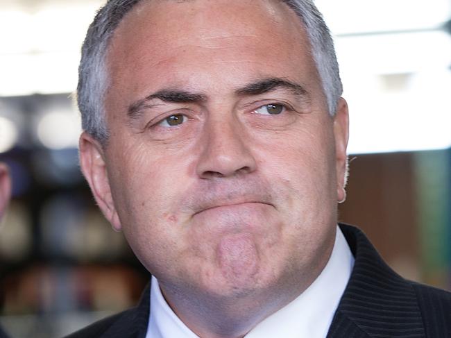 Australian Federal Treasurer Joe Hockey during a visit to a manufacturing business in Padstow, Sydney, Thursday, July 23, 2015. (AAP Image/Carol Cho) NO ARCHVING