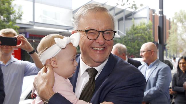 BRISBANE, AUSTRALIA - NewsWire Photos APRIL 27, 2023: Prime Minister Anthony Albanese picks up baby Ella, 10 months, during a visit to the Orion Springfield Central Shopping Centre in Ipswich, Queensland. Picture: NCA NewsWire/Tertius Pickard
