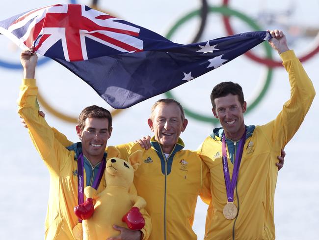 Mat Belcher and Mal Page with their coach Victor Kovalenko after winning gold in London.