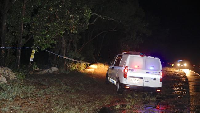 Police in Lucas Heights bushland where a man was found shot. Picture: Steve Tyson