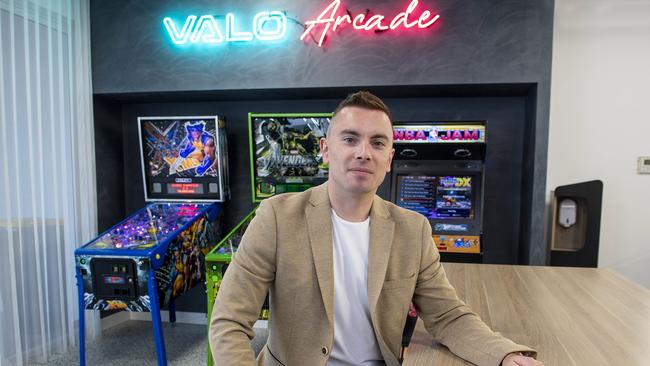 Valo CEO and founder Aaron Hickmann in the Valo Arcade room at his offices and factory at Kent Town. Picture Mark Brake