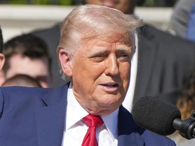 President Donald Trump speaks as he welcomes the Super Bowl champion Philadelphia Eagles NFL football team to the South Lawn of the White House, Monday, April 28, 2025, in Washington. (AP Photo/Mark Schiefelbein)
