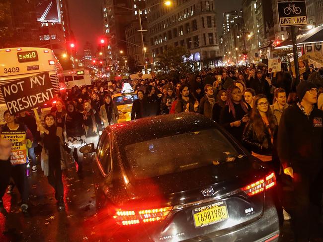Hundreds of anti-Donald Trump protestors march through traffic on Broadway on their way to Trump Tower, November 9, 2016 in New York City. Picture: AFP