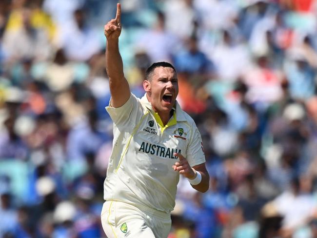 Scott Boland ripped the heart out of the Indian fightback. (Photo by Glyn KIRK / AFP)