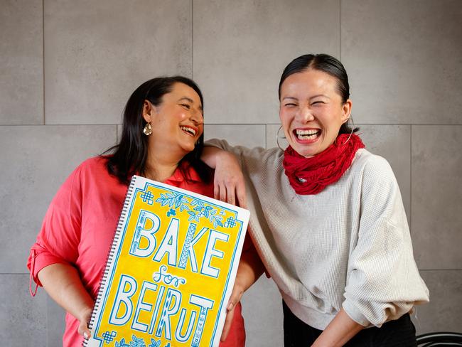 Former MasterChef contestants Rose Adam and Poh Ling Yeow with the cover of Rose's book on October 16, 2020 in Melrose Park. Picture Matt Turner.