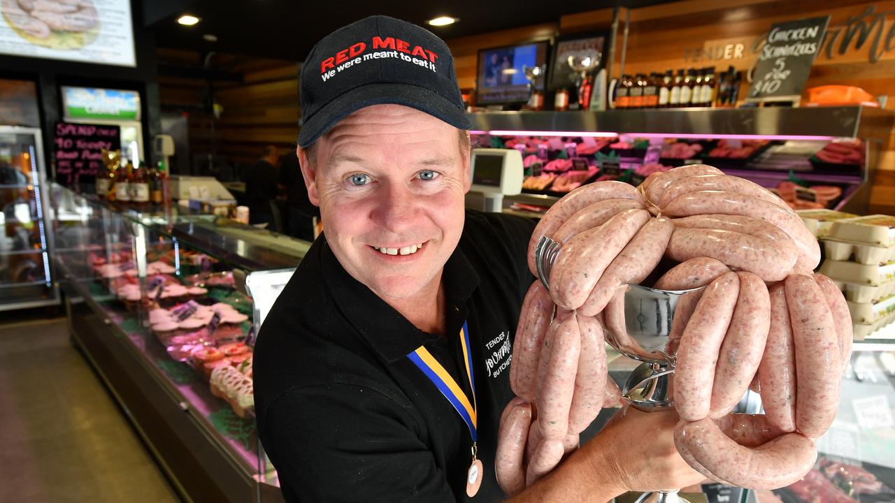 Butcher Adam Stratton with some of his award-winning gourmet sausages at Tender Gourmet Butchery in Hornsby. Picture: Joel Carrett