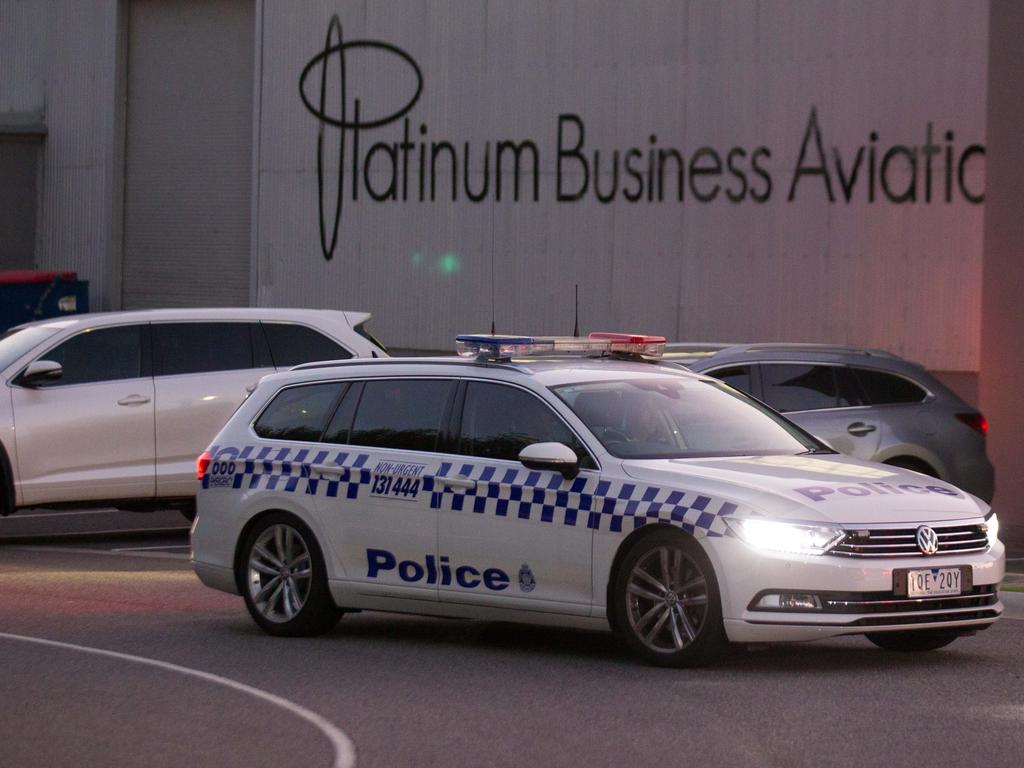 Police arrive at Essendon airport ahead of the jet’s arrival.