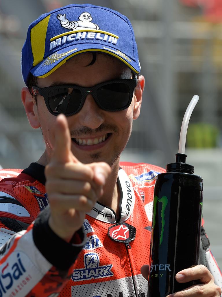 Jorge Lorenzo celebrates after taking pole.