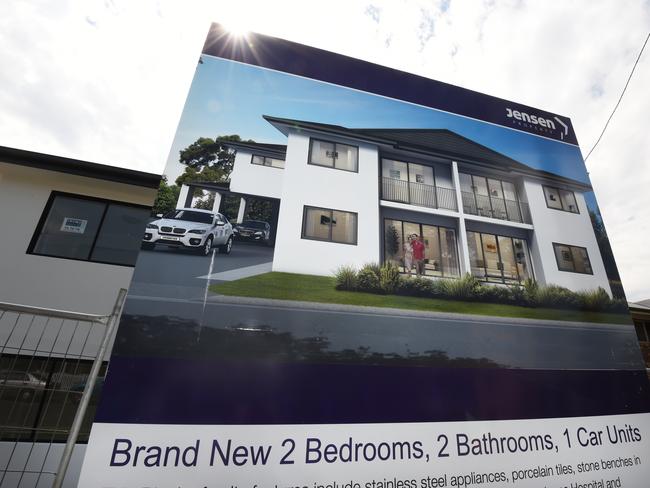 Nearly-completed units are advertised for sale for sale in Brisbane, Tuesday, Dec. 2, 2014. Approvals for the construction of new homes rose 11.4 per cent across Australia in October, following an 11.2 per cent fall in September. (AAP Image/Dan Peled) NO ARCHIVING