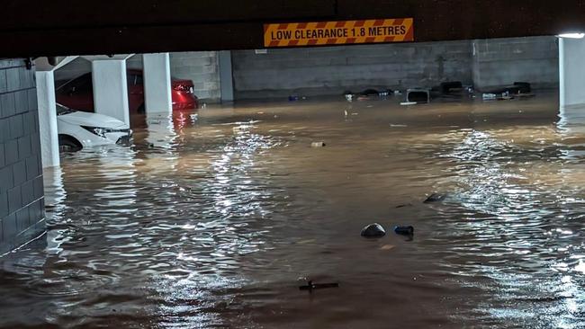 Fifteen cars parked in the Chateau Bohemia underground carpark have been written off after a blocked drain caused huge flooding in Edge Hill on Saturday.