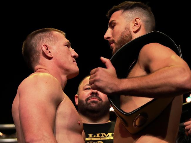 NEWCASTLE, AUSTRALIA - MAY 10: Paul Gallen faces off with opponent Kris Terzievski during the King of the Castle Official Weigh-In at Civic Theatre on May 10, 2022, in Newcastle, Australia. (Photo by Peter Lorimer/Getty Images)