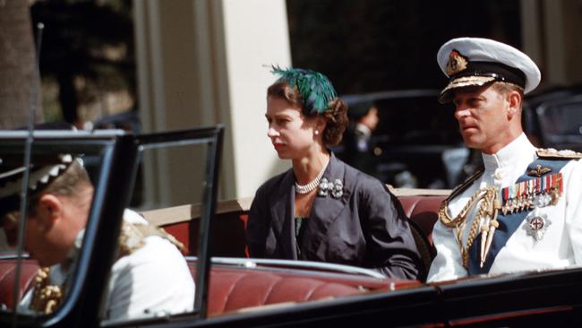 Queen Elizabeth II and Prince Philip on the way to the Adelaide War Memorial during their 1954 Australia tour. Picture: Getty Images.