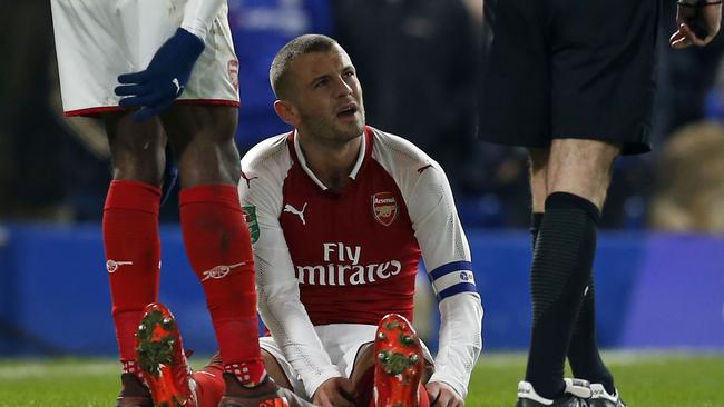Arsenal's English midfielder Jack Wilshere after picking up an injury.