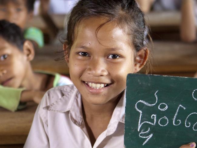 Pic shows: Chaum Sreypar in class at at Kampong Pang School. Oxfam have been building new schools in remote areas with minimal access to services, including Kampong Pang School. Facilities built include a water tank, the school building, latrines/toilets and the teachers house with solar power. Picture: Oxfam Australia