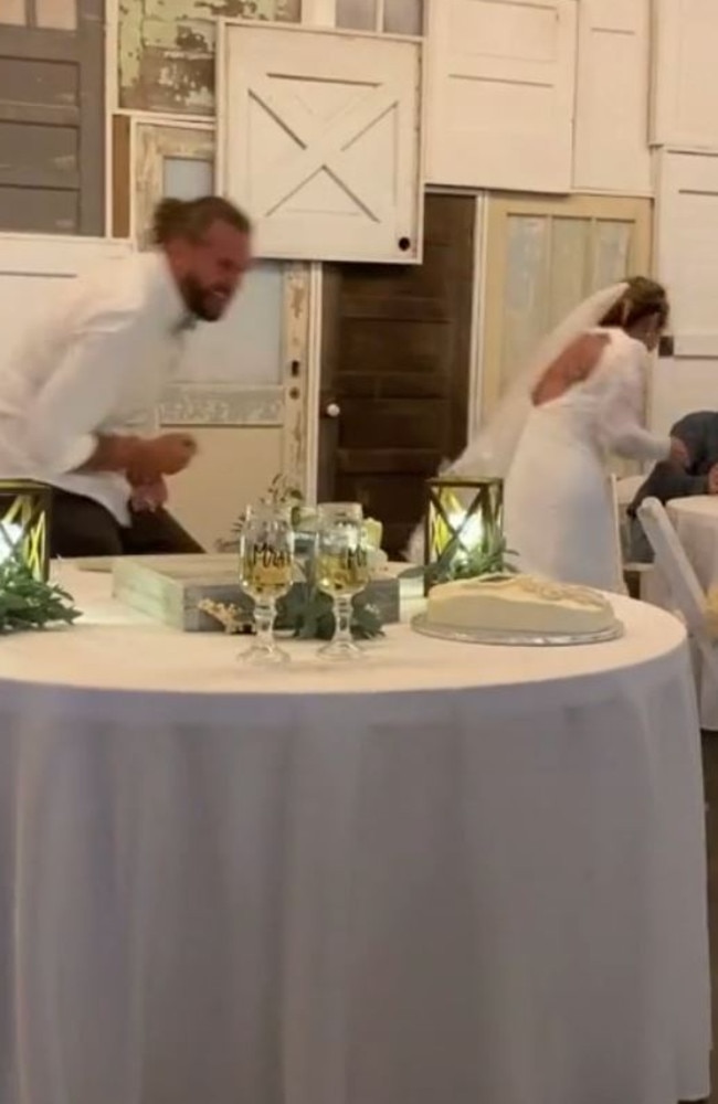 The impact forces her to stumble into the chair behind her. Picture: TikTok/kelsboyd3
