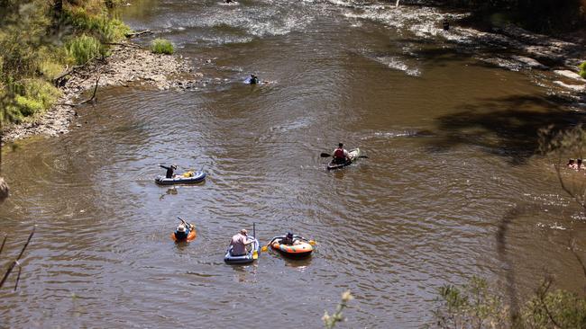 People cool off at along the Yarra River at Pound Bend in Warrandyte as Melbourne swelters through a heatwave. Picture: NewsWire / Diego Fedele